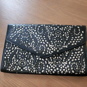 Black clutch  with  silver   gold detail